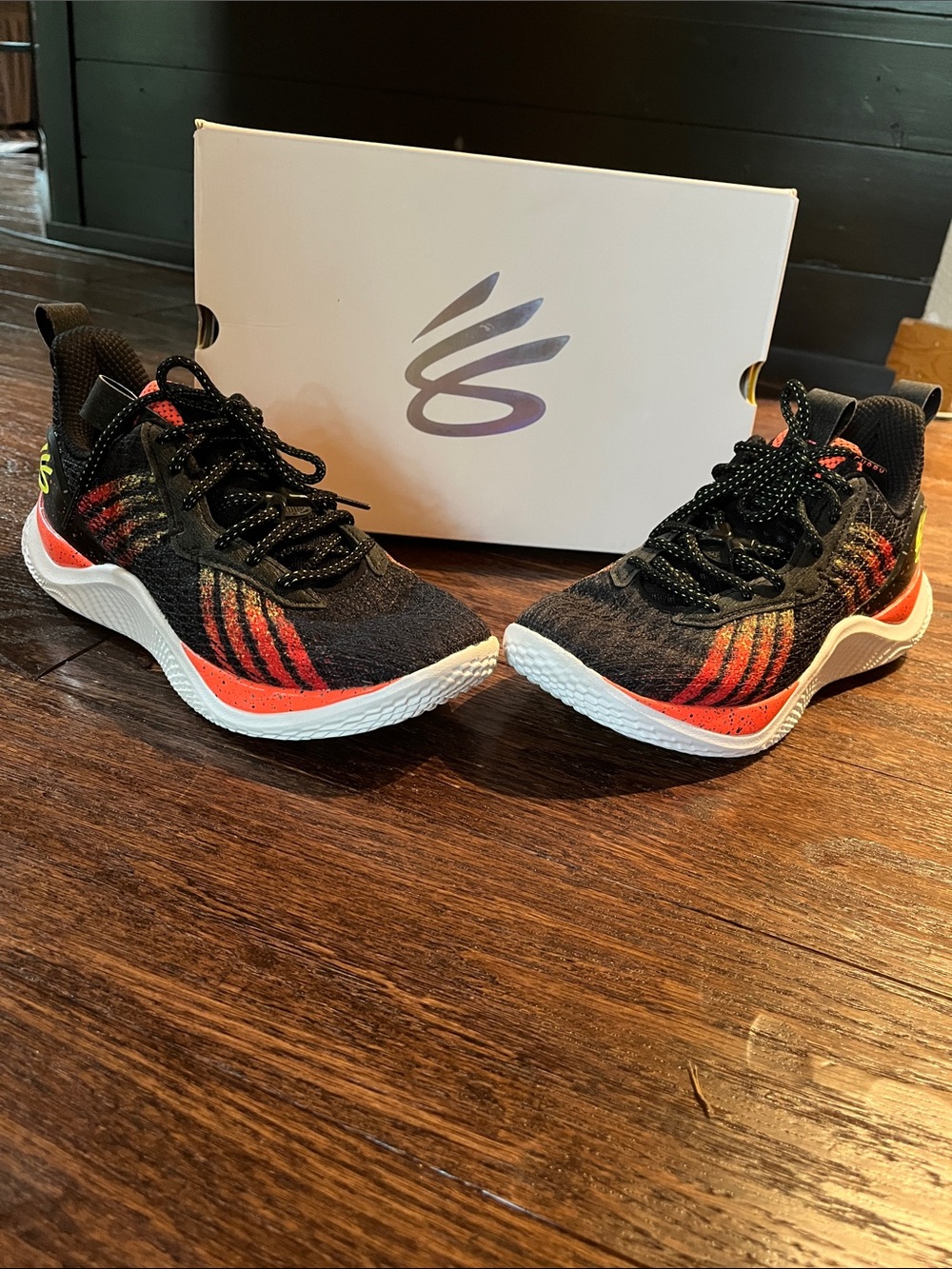 Curry 10 Iron Sharpens Iron black & orange bots sneakers size 7Y